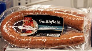 Smithfield Foods products are displayed at a local grocery store Thursday, June 5, 2008, in Columbia, S.C. Simthfield Foods Corp., the nation's largest hog producer and pork processor, said Thursday that fourth-quarter profits fell 94 percent, hurt by ris