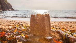 Sand castle on Hope Cove beach, Devon, England, United Kingdom.