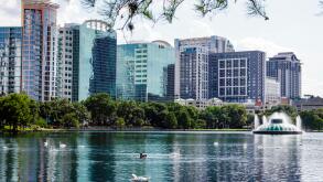 Orlando Florida,Downtown,Lake Eola Park,public park,city skyline,high-rises,commercial office buildings,modern architecture,fountain,ducks,FL190511061