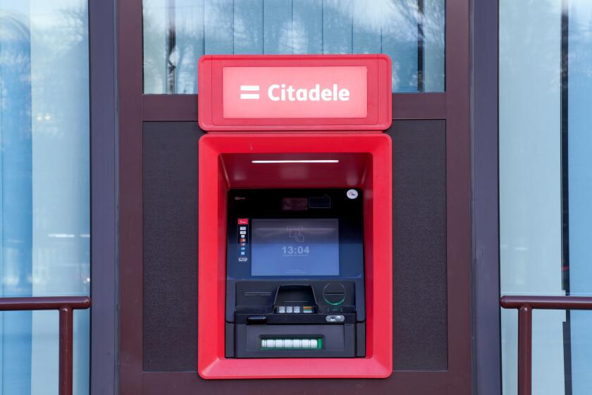 Riga, Latvia - November 30, 2019 : Citadele ATM, electronic banking outlet that allows customers to complete basic transactions, Latvian bank and fina