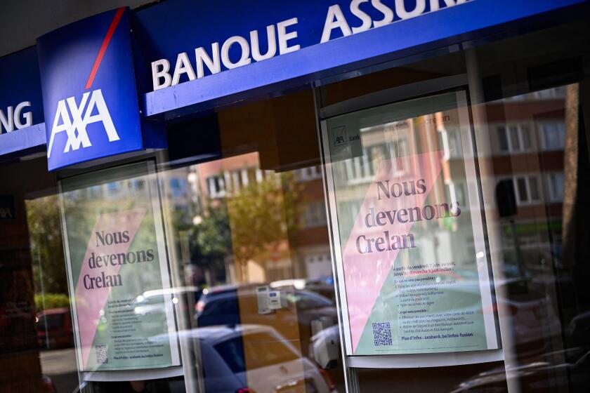 Ixelles, Belgium. 29th May, 2024. Illustration picture shows an office of the AXA bank in Brussels, Monday 27 May 2024. AXA and Crelan decided to merge together into Crelan in june. BELGA PHOTO LAURIE DIEFFEMBACQ Credit: Belga News Agency/Alamy Live News