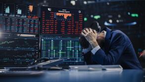 Stressed Stock Exchange Trader Can't Apprehend a Sudden Stock Market Collapse. Financial Crisis Concept with Stock Broker Saddened by Negative Ticker Information, Red Graphs and Real-Time Data