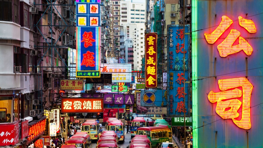 Street scene, Mini bus station and Neon lights of Mong Kok, Kowloon, Hong Kong, China