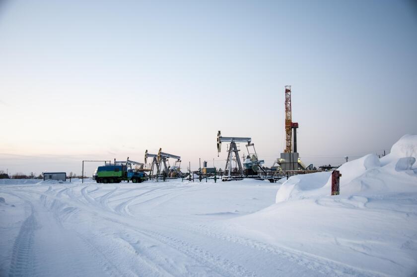 Oil field. Drilling rig and oil pump.. Image shot 10/2018. Exact date unknown.