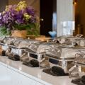 heating trays on buffet line ready for service. breakfast and lunch buffet food catering banquet in hotel or restaurant.