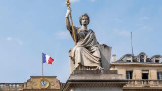 Assemblee Nationale (French National Assembly) Parliament. Statue The Law. Place du Palais Bourbon. French flag. Paris, France, Europe EU - Copy space