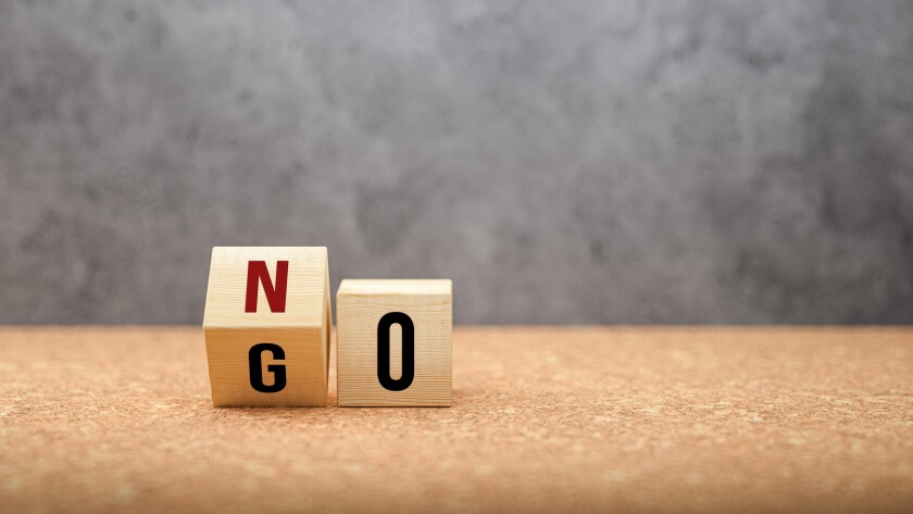 No versus Go concept with words on wooden cubes