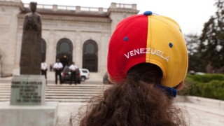Woman wearing Venezuela cap