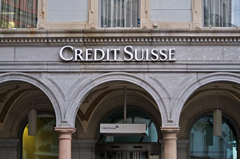 Lugano, Switzerland - 12th January 2021 : Exterior of Credit Suisse Bank building on the Piazza Riforma in Lugano. Credit Suisse is a global wealth ma
