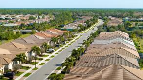 Wealthy neighborhood with expensive houses in southern Florida. Development of US premium housing market
