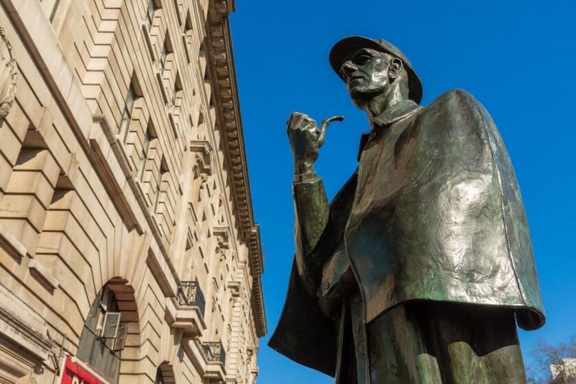 Sherlock Holmes statue outside Baker Street underground station, London, UK