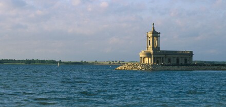 Normanton Church stands by the edge of Rutland Water a reservoir of Anglian Water Rutland England. Image shot 2003. Exact date unknown.