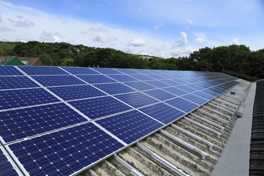 Solar panels factory roof green from Alamy 20Jan22 575x375