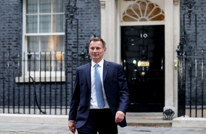 London, UK. 14th Oct, 2022. Newly appointed UK Chancellor of the Exchequer Jeremy Hunt leaves 10 Downing Street in London, Britain, on Oct. 14, 2022. Jeremy Hunt, former foreign secretary of the United Kingdom (UK), has been appointed as chancellor of the