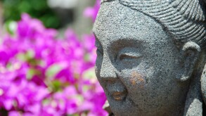 Smiling statue in the gardens of Wat Po,Bangkok,Thailand.. Image shot 2008. Exact date unknown.