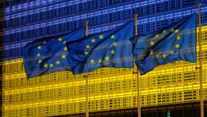Belgium, Brussels, May 2022: facade of the Berlaymont building , headquarters of the European Commission, lit up in the colours of the Ukrainian flag.