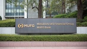 MUFG - Mitsubishi UFJ Financial Group Company sign in front of the Head office in Chiyoda City.