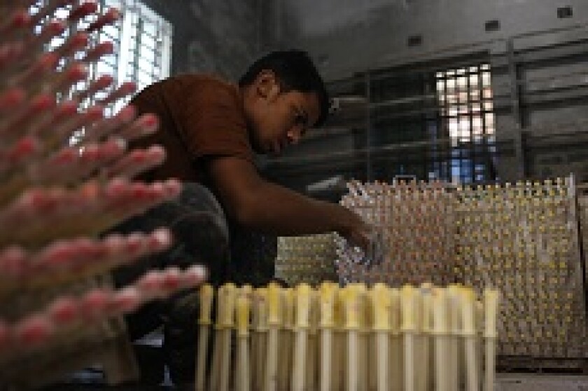 Modern slavery boy balloon factory Bangladesh PA 12Nov19 229x150