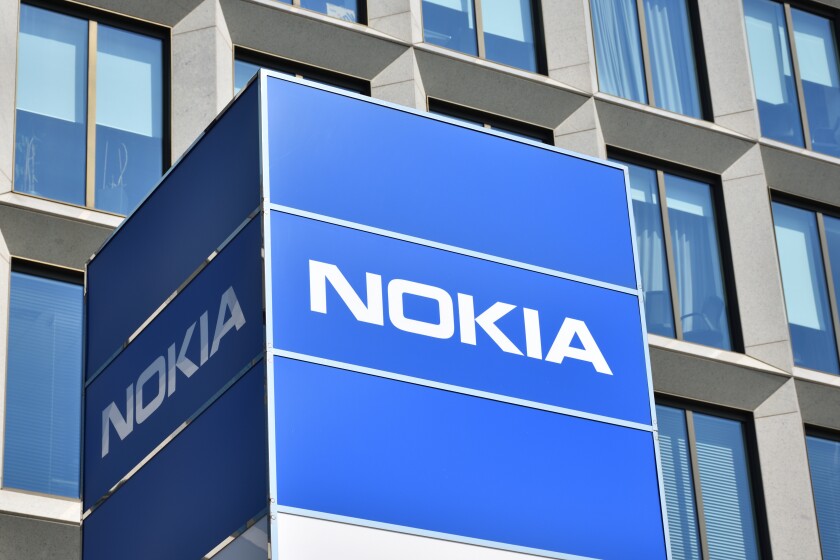 Nokia sign, logo, emblem at Nokia Solutions and Networks buildin