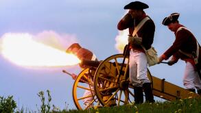 Shot from a historical cannon fire and smoke
