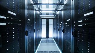 Shot of a Working Data Center With Rows of Rack Servers.