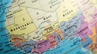 West Africa map on a globe focused on Ivory Coast