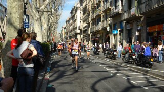 Barcelona Marathon race through the historical La Rambla. Barcelona, Spain.