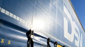 DSV curtain side trailer. DSV A/S is a Danish transport and logistics company offering transport services worldwide by road, air, sea and train.