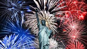 Statue of Liberty, blue white and red fireworks July 4th celebration in New York