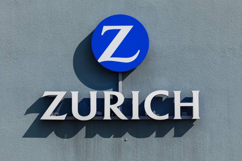 Stade, Germany - August 22, 2019: Signage on wall identifying a Zurich Insurance Group Ltd. branch office. The company is Switzerland's largest insure