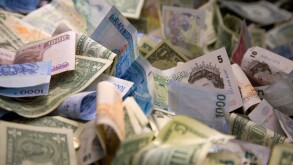 Bank notes from multiple countries in a donation box at the British Museum London England. Image shot 2007. Exact date unknown.