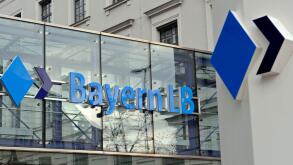 FILE - In this Dec. 1, 2008 file photo, the company logo of the BayernLB bank is seen at the headquarters in Munich, southern Germany. Prosecutors searched the offices of German bank BayernLB on Wednesday Oct. 14, 2009, as part of an investigation of a fo