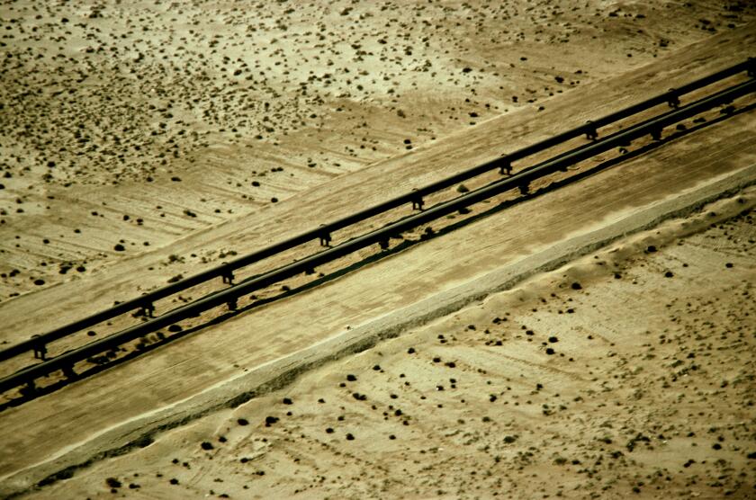 Pipelines in the desert of Saudi Arabia from the Aramco oil fields. Middle East.. Image shot 1984. Exact date unknown.