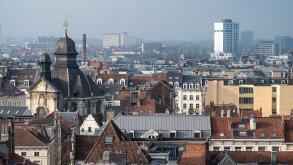 High angle view over historical rooftops and monuments in Brussels old town, Belgium, JAN 17, 2025