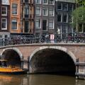 Amsterdam, The Netherlands - 21 June 2022: Old bridge in central Amsterdam