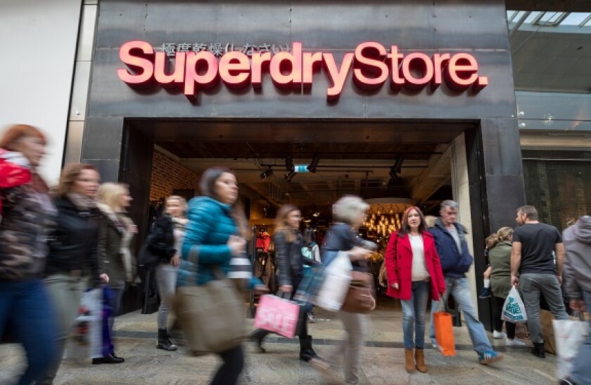 Shoppers outside a Superdry Store in the UK