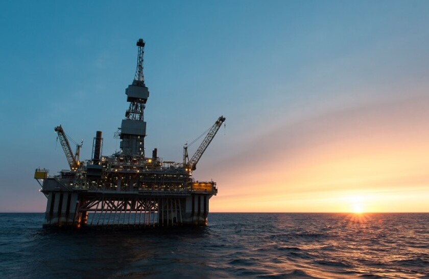 Oil rig at sun set in the North Sea