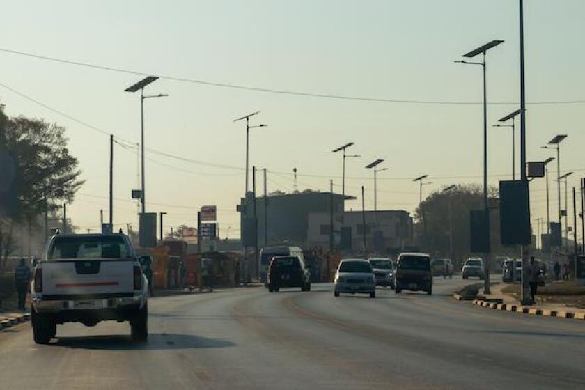 Traffic at Alick Nkhata Road in Lusaka, Zambia, Alamy, 575