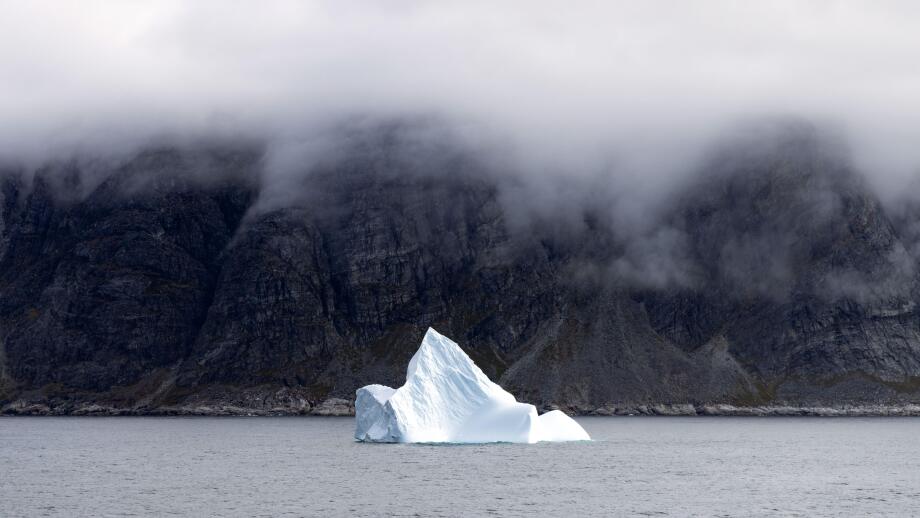 Greenland iceberg - one iceberg in a Greenland fjord, southern Greenland landscape, Arctic, Europe.