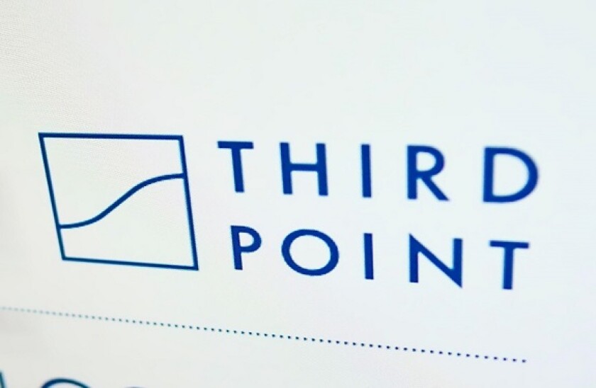 High angle view of business website with logo of US investment company Third Point LLC on monitor. Focus on top-right of screen. Unmodified photo.