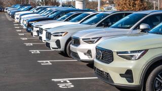 New Volvo vehicles lined up for sale at a dealership
