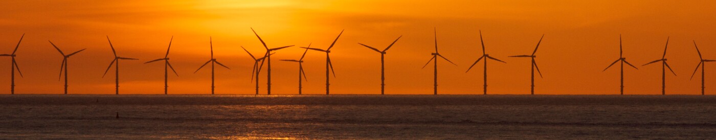 Wind farm with the sun setting in the background