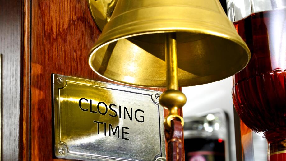 'Closing Time' bell in a British bar