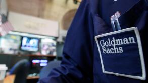 A trader works at the Goldman Sachs stall on the floor of the New York Stock Exchange, April 16, 2012.  REUTERS/Brendan McDermid/File Photo