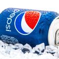 Can of Pepsi cola on a bed of ice and white background, Pepsi is a carbonated soft drink produce