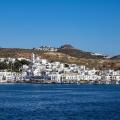 View from the sea to the town of Adamas with Plaka on a hill in the distance, Adamas, Milos, South Aegean, Greece, Europe