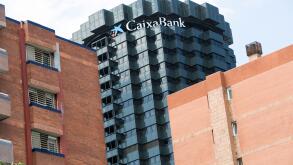 A logo sign outside of the headquarters of the La Caixa group and Caixa Bank in Barcelona, Spain on August 24, 2017.