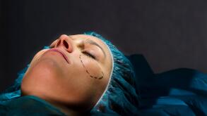 Woman undergoing plastic surgery