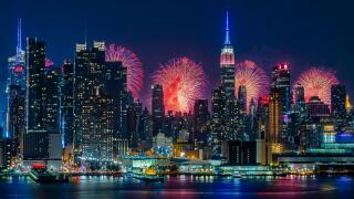 NYC Fireworks Celebration -  New York City skyline with the Macy's Spectacular 4th of July Fireworks Celebration Show as a backdrop to midtown Manhattan.