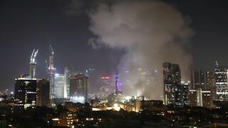 (250613) -- TEL AVIV, June 13, 2025 (Xinhua) -- Smoke rises following an Iranian missile attack in Tel Aviv, Israel, on June 13, 2025. Dozens of missiles were fired from Iran into Israel on Friday evening, according to statements issued by the Israel Defe